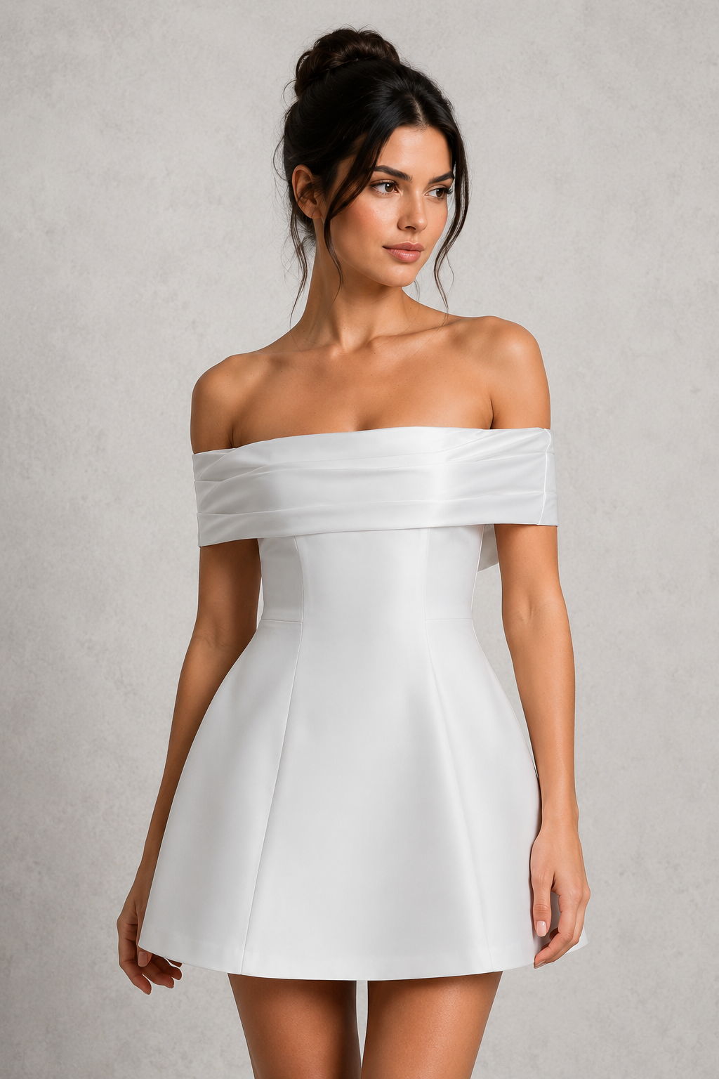 Woman wearing a Bardot off-the-shoulder mini dress with a fitted crepe bodice, contrast neckline, voluminous bubble skirt, and statement bow detail at the back for parties and special occasions.