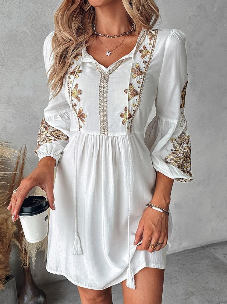Women’s boho midi dress with floral embroidery and tie detail, relaxed fit and flowy silhouette