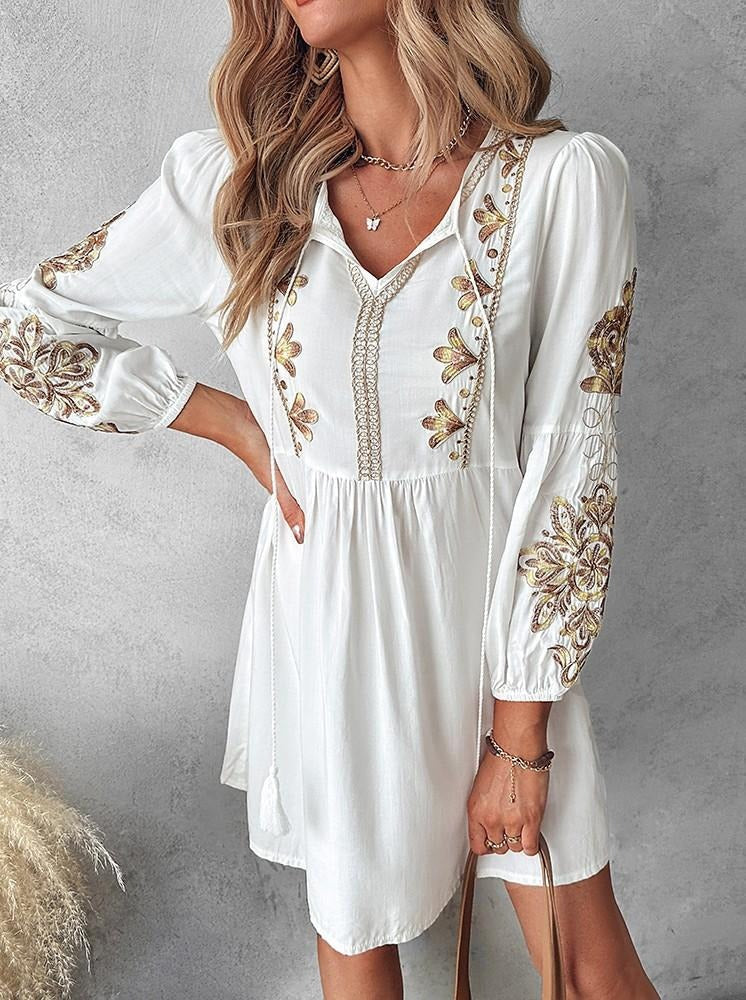 Women’s boho midi dress with floral embroidery and tie detail, relaxed fit and flowy silhouette