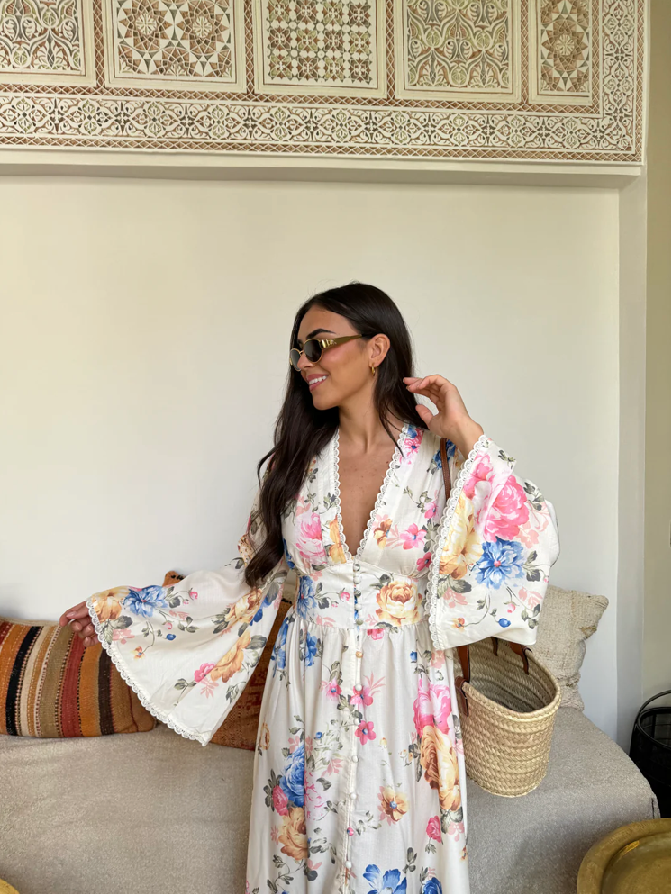 Women’s boho floral maxi dress with deep V-neck, bell sleeves and cinched waist