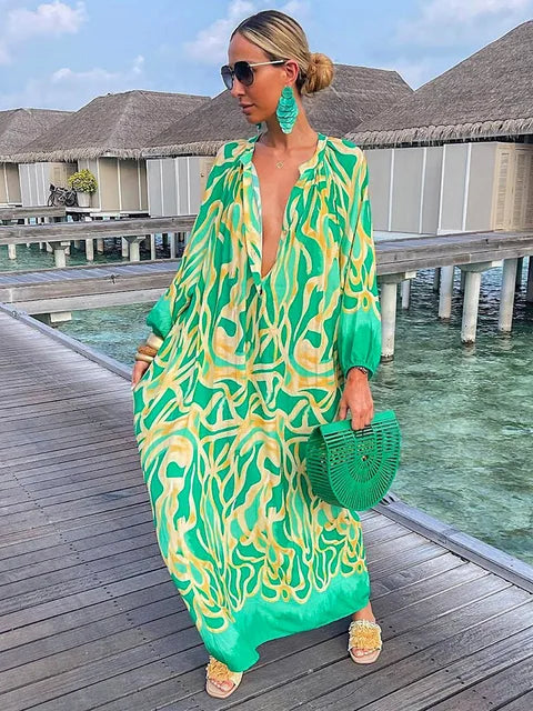 Women’s boho print maxi dress with deep V neck and long sleeves in ankle length silhouette