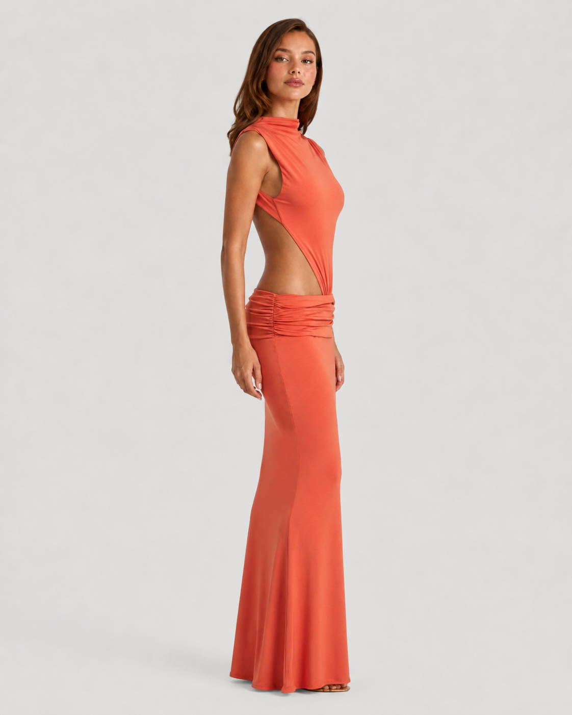 Women's bodycon maxi dress in premium modal jersey featuring a high neckline, cut-out side detail, open back, ruched dropped waist, and flowing flared hem, designed for elegant evening occasions and formal events.