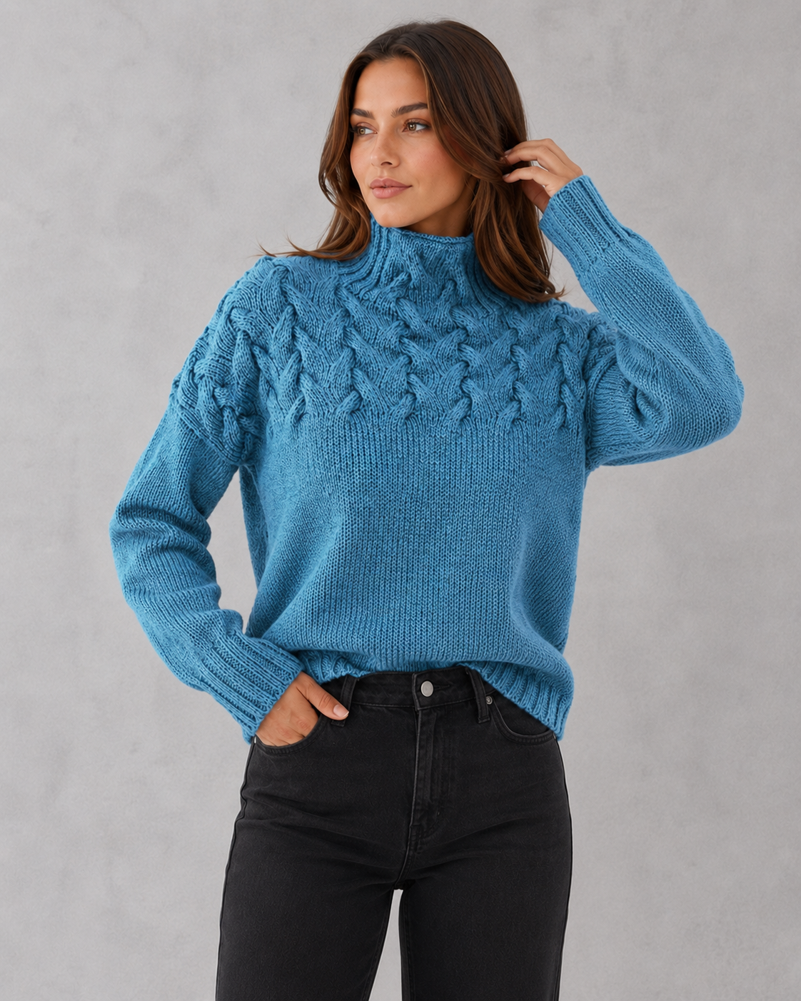 Women's classic turtleneck knit sweater in a relaxed fit, featuring a soft luxurious knit fabric for warm and comfortable everyday winter wear.