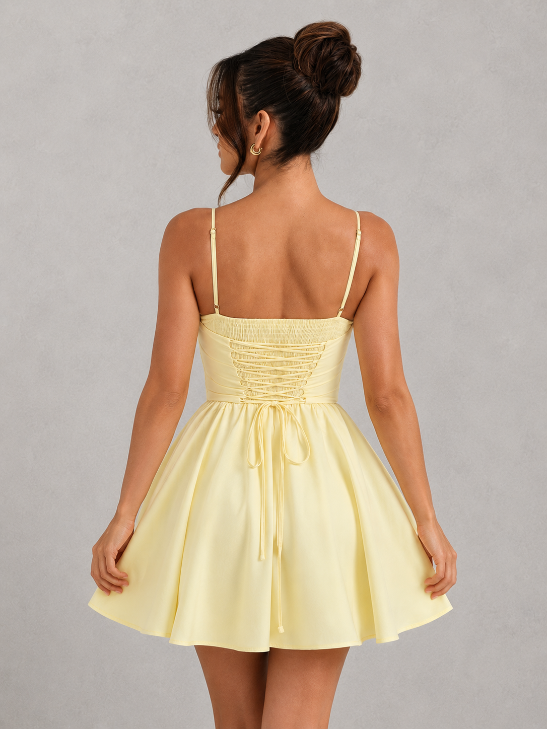 Women's corset mini dress with a sweetheart neckline, structured boned bodice, adjustable straps, lace-up back, and a full flared skirt in lightweight cotton blend fabric, ideal for parties, weddings, and special occasions.