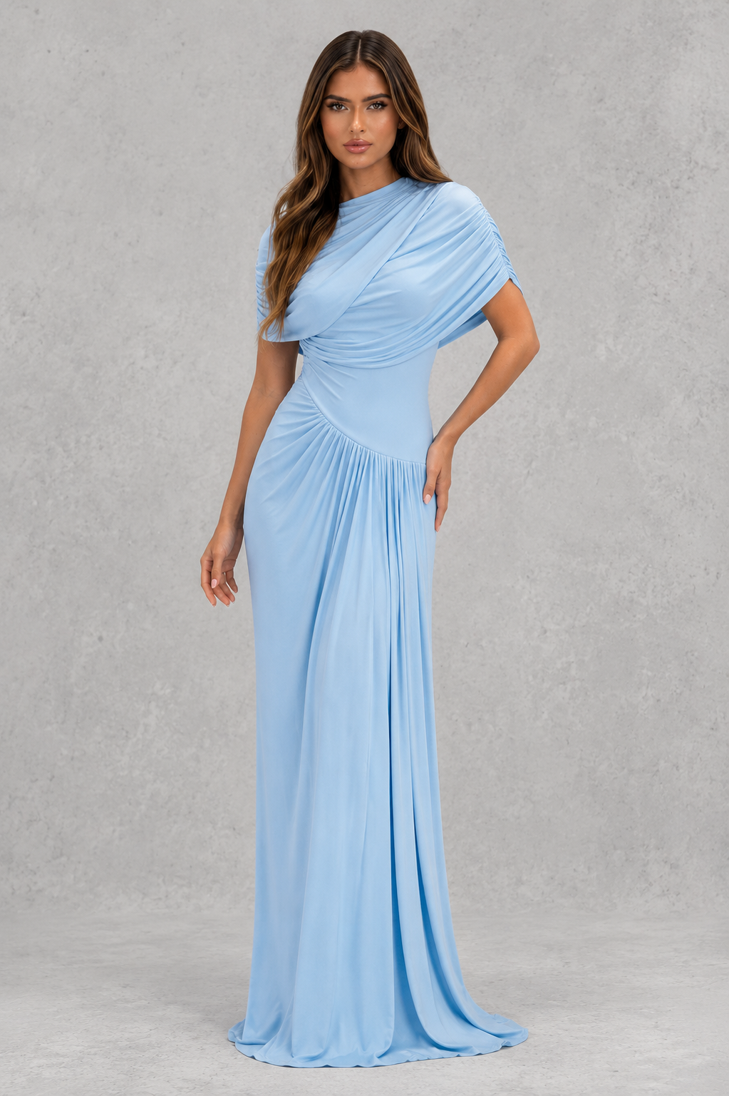 Baby blue women’s draped maxi dress with sculptural pleats, a crew neckline, sleeveless design, and elegant flowing shawl detail.