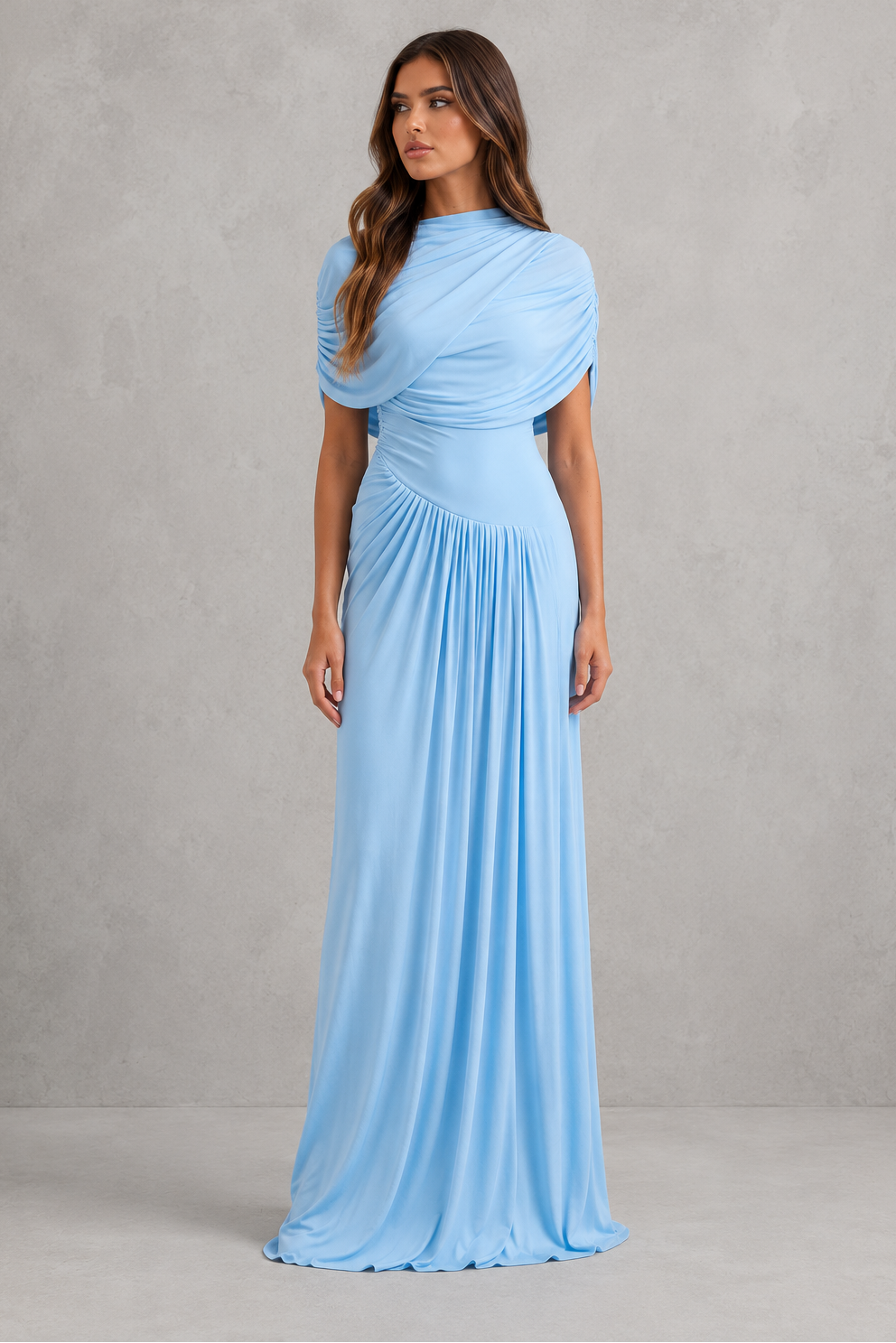 Baby blue women’s draped maxi dress with sculptural pleats, a crew neckline, sleeveless design, and elegant flowing shawl detail.