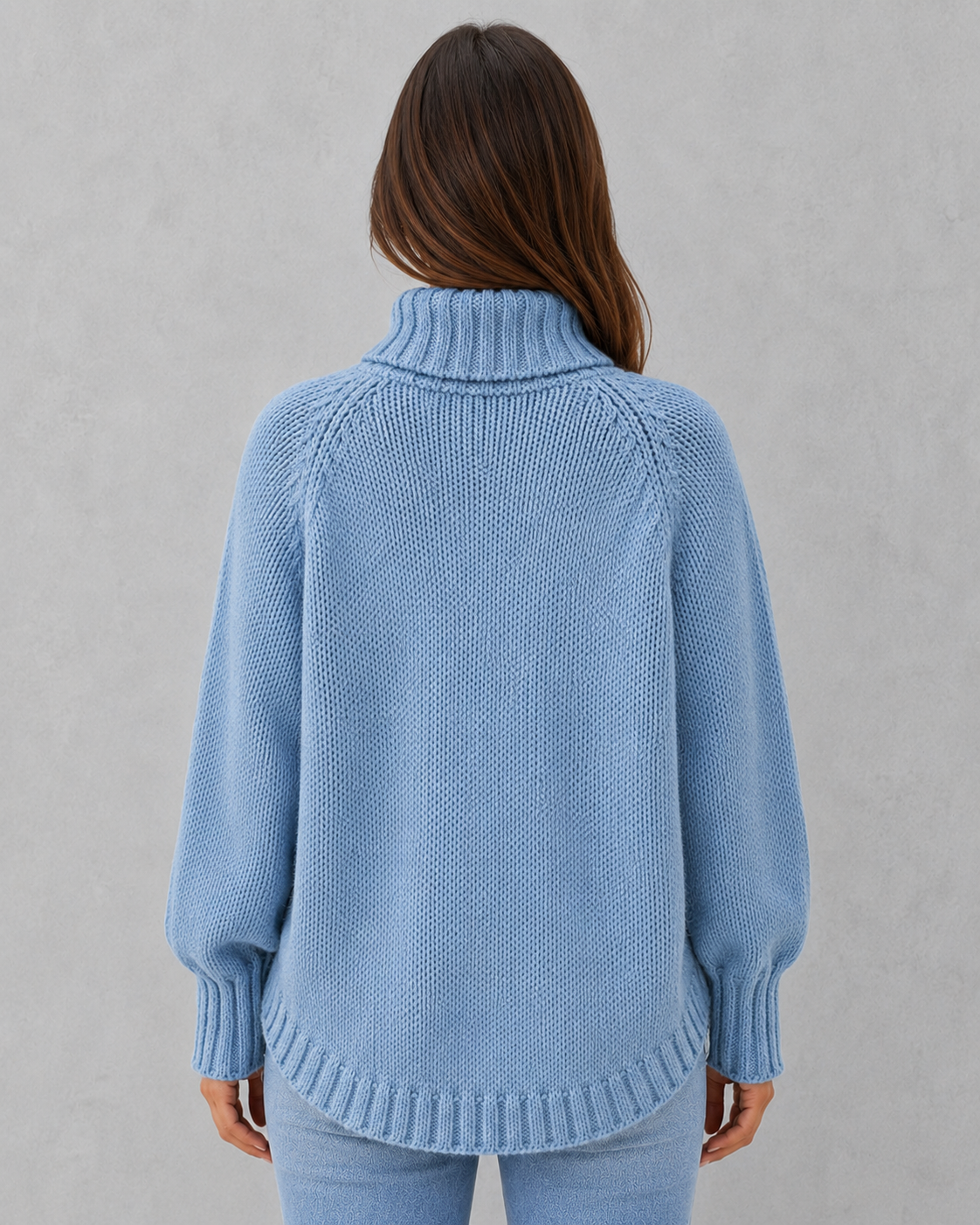 Women's elegant knitted pullover dress featuring a relaxed fit silhouette, soft breathable knit fabric, and timeless design for casual and evening wear.