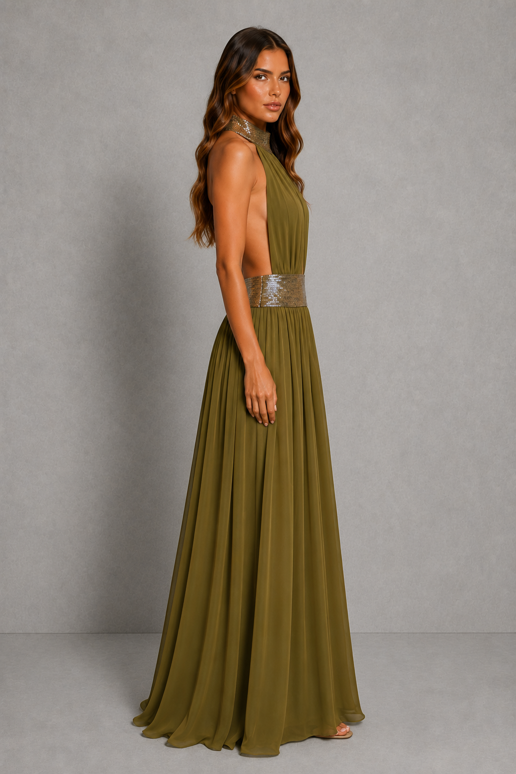 Women’s embellished halter chiffon maxi dress with deep plunge neckline, beaded waistband, open back and flowing floor-length skirt.