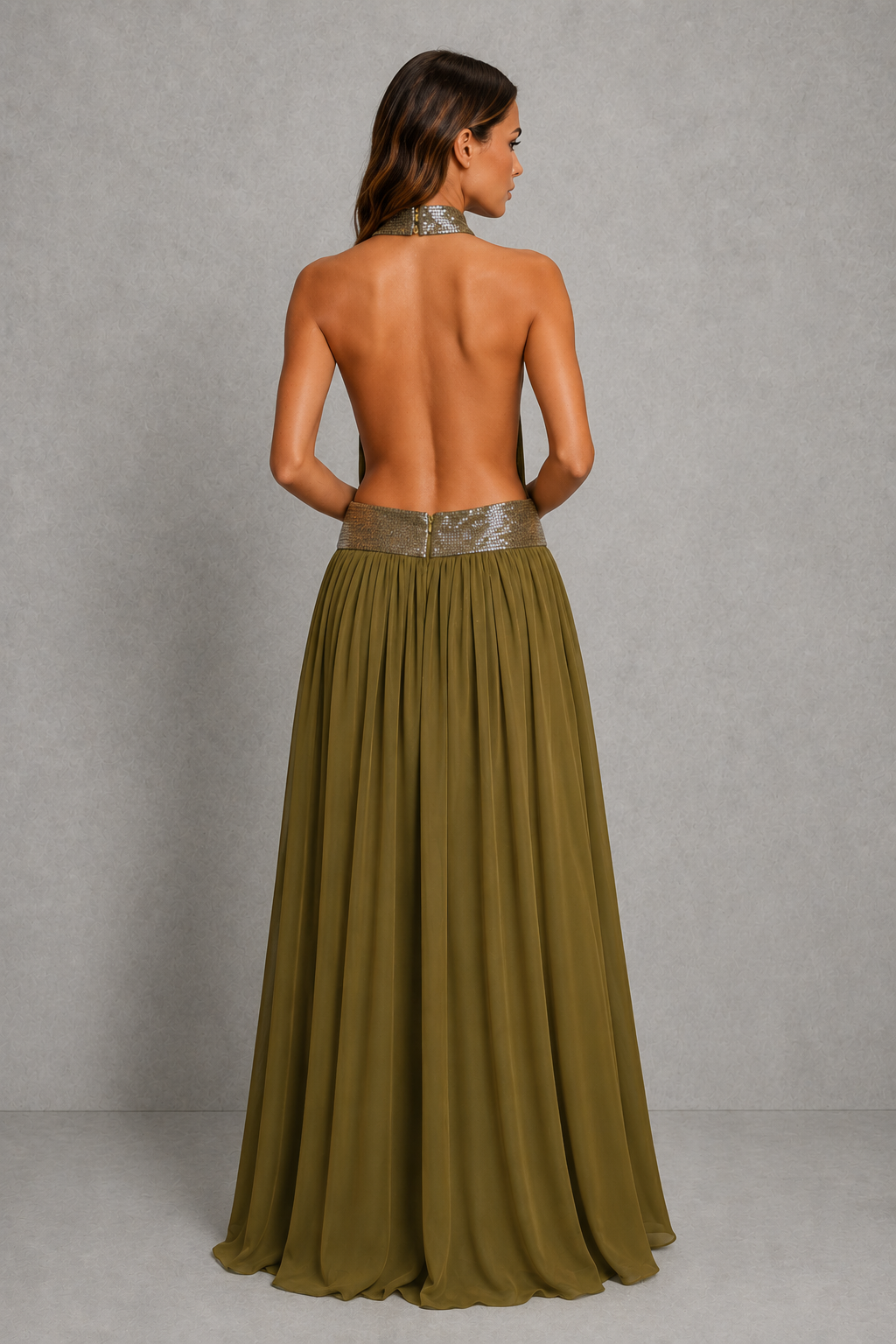 Women’s embellished halter chiffon maxi dress with deep plunge neckline, beaded waistband, open back and flowing floor-length skirt.