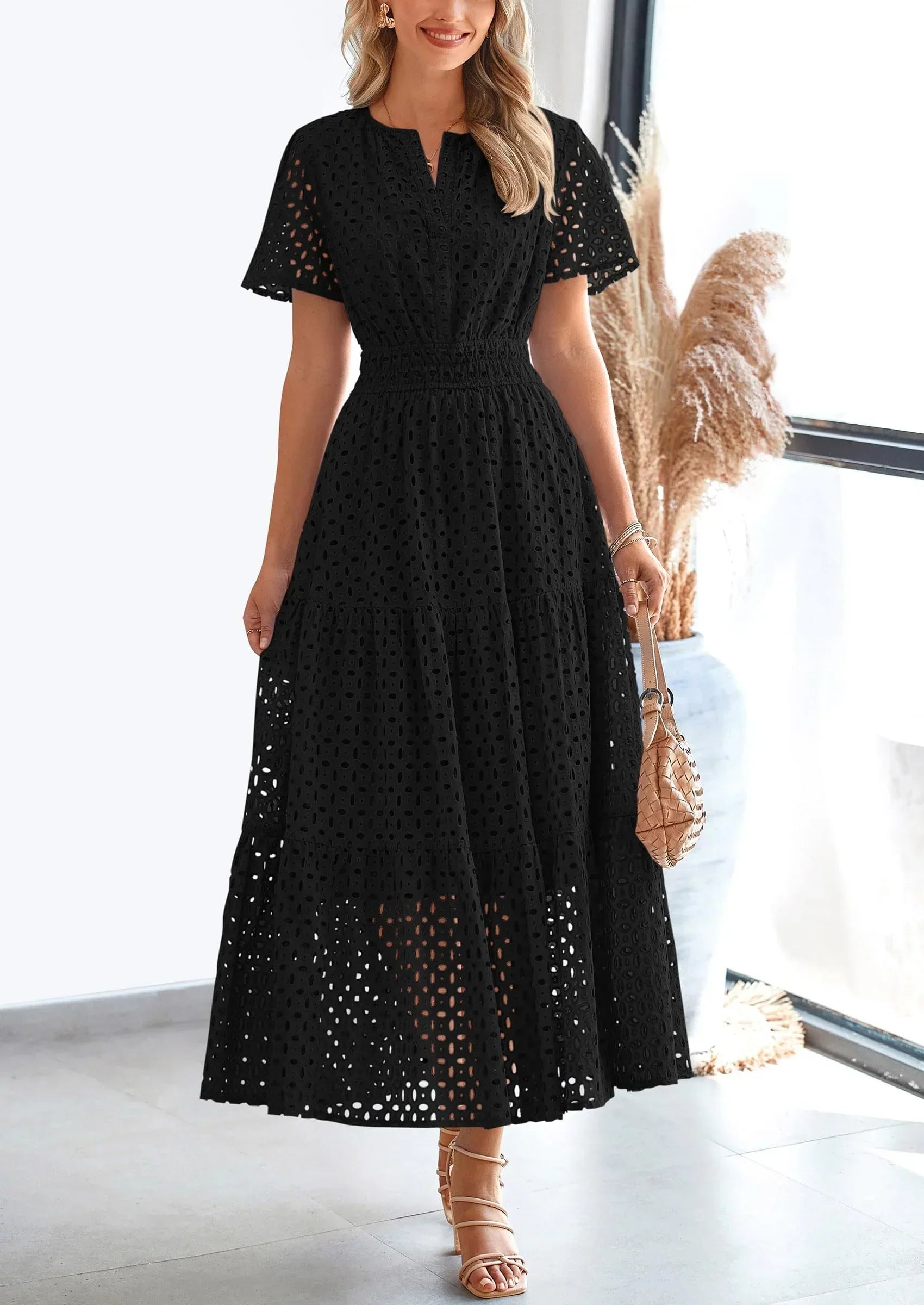 Women’s eyelet cotton summer dress with A-line fit and lightweight breathable fabric for warm weather
