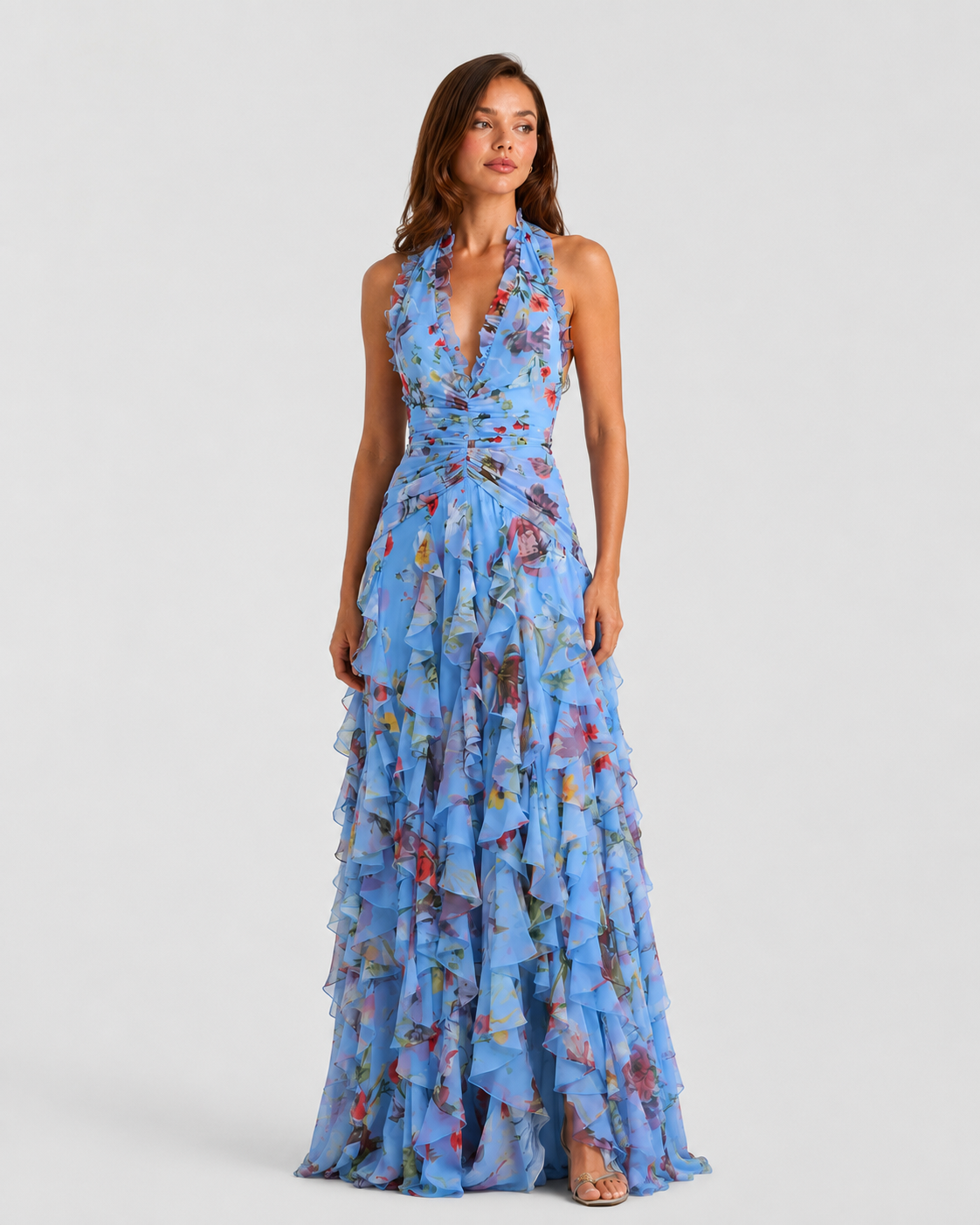 Women’s floral halter maxi dress featuring a gathered halter neckline, ruched waist, and flowing tiered skirt, ideal for weddings, garden parties, and summer events.