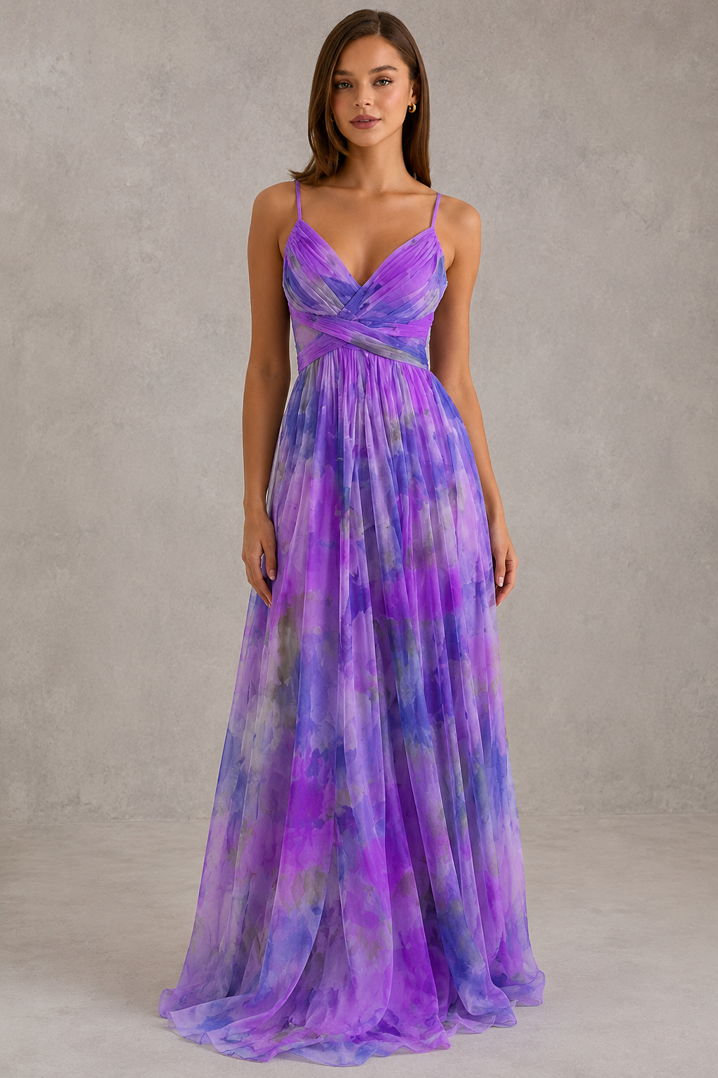 Women’s floral maxi dress by Klyne Studios featuring a flowing full-length silhouette, adjustable tie-back detail, lightweight breathable fabric, and relaxed fit for warm-weather styling.