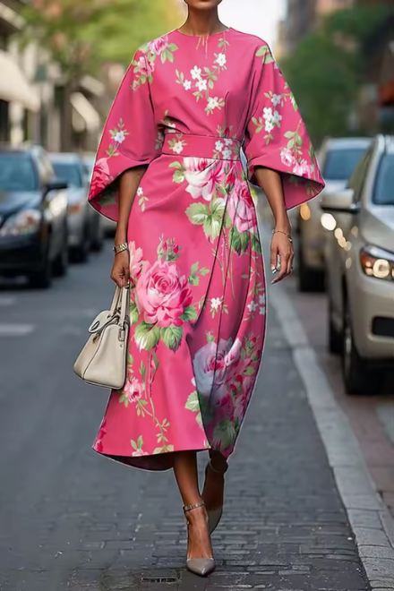 Women’s floral midi dress with flowing silhouette for summer and evening events
