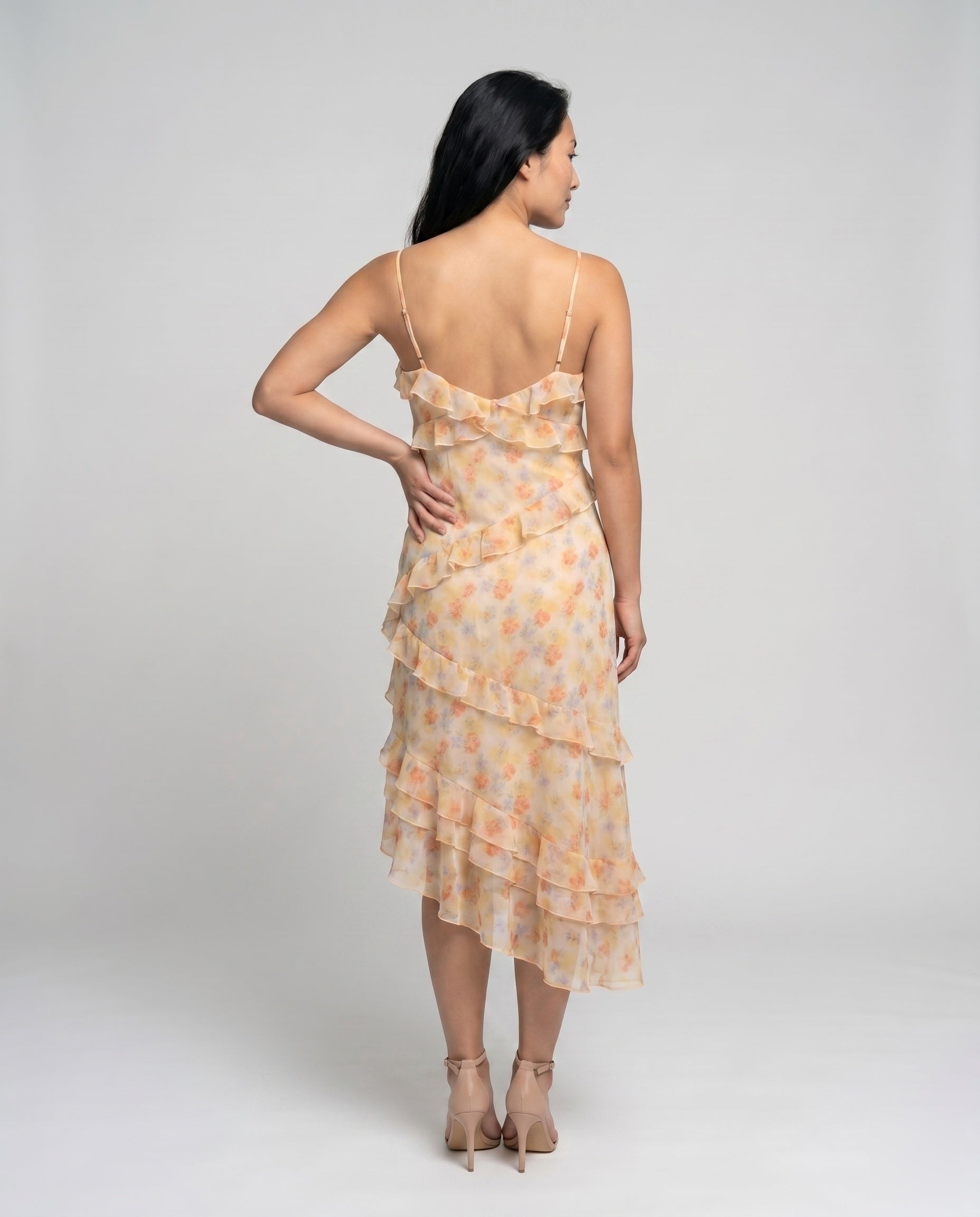 Women’s floral off-shoulder midi dress featuring delicate ruffle detailing, a flowing silhouette, and lightweight sheer fabric, ideal for summer occasions, vacations, and warm-weather styling.