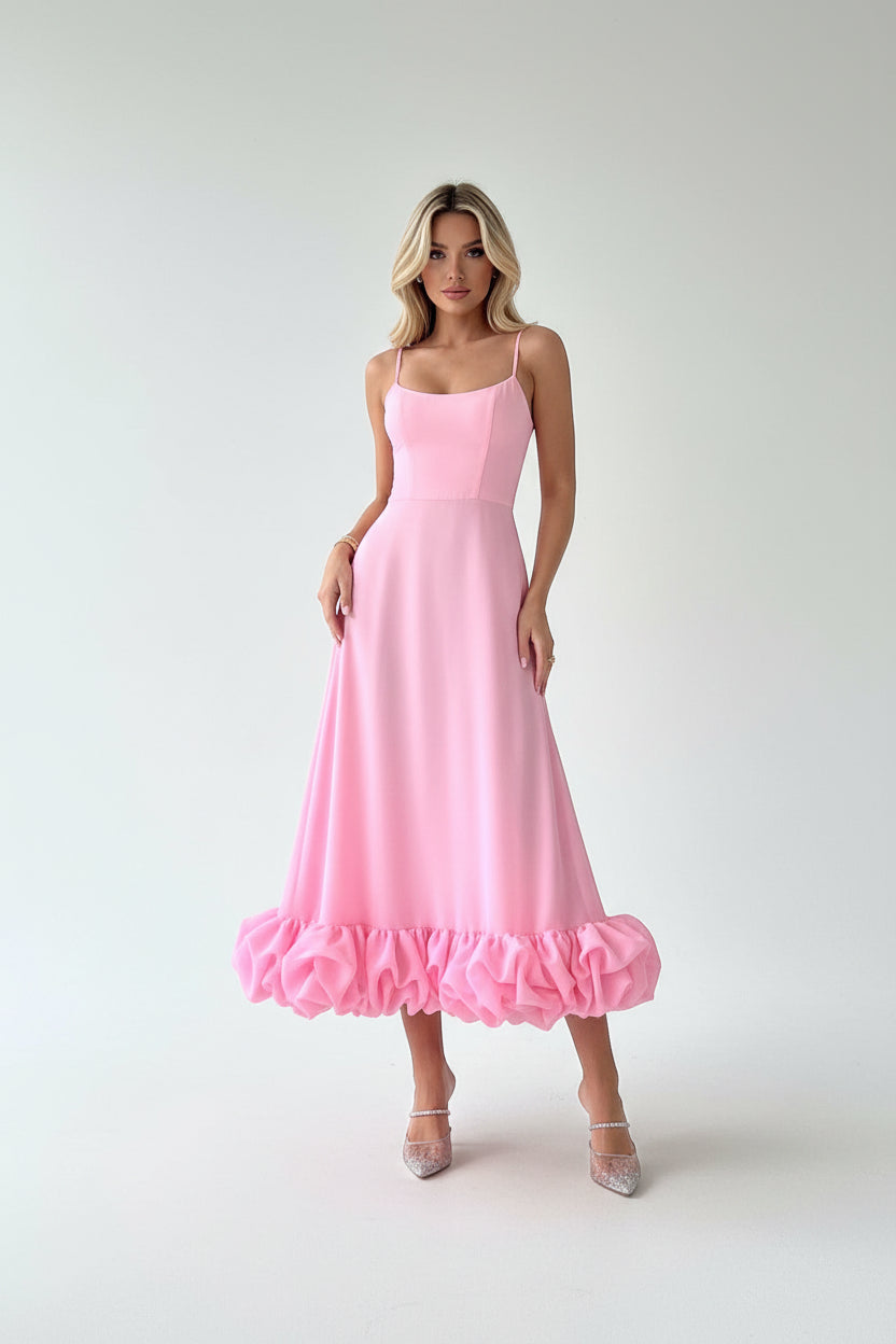 Women’s flowing midi dress with defined waist and lightweight fabric
