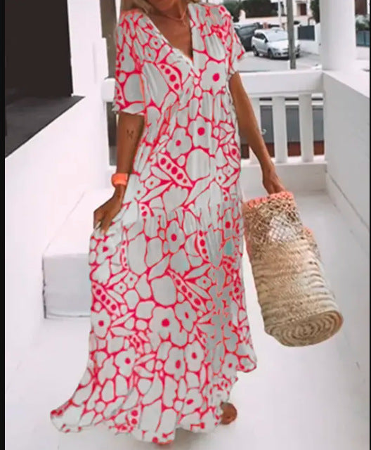 Women’s green printed short sleeve maxi dress with V neck and A-line silhouette in stretch fabric