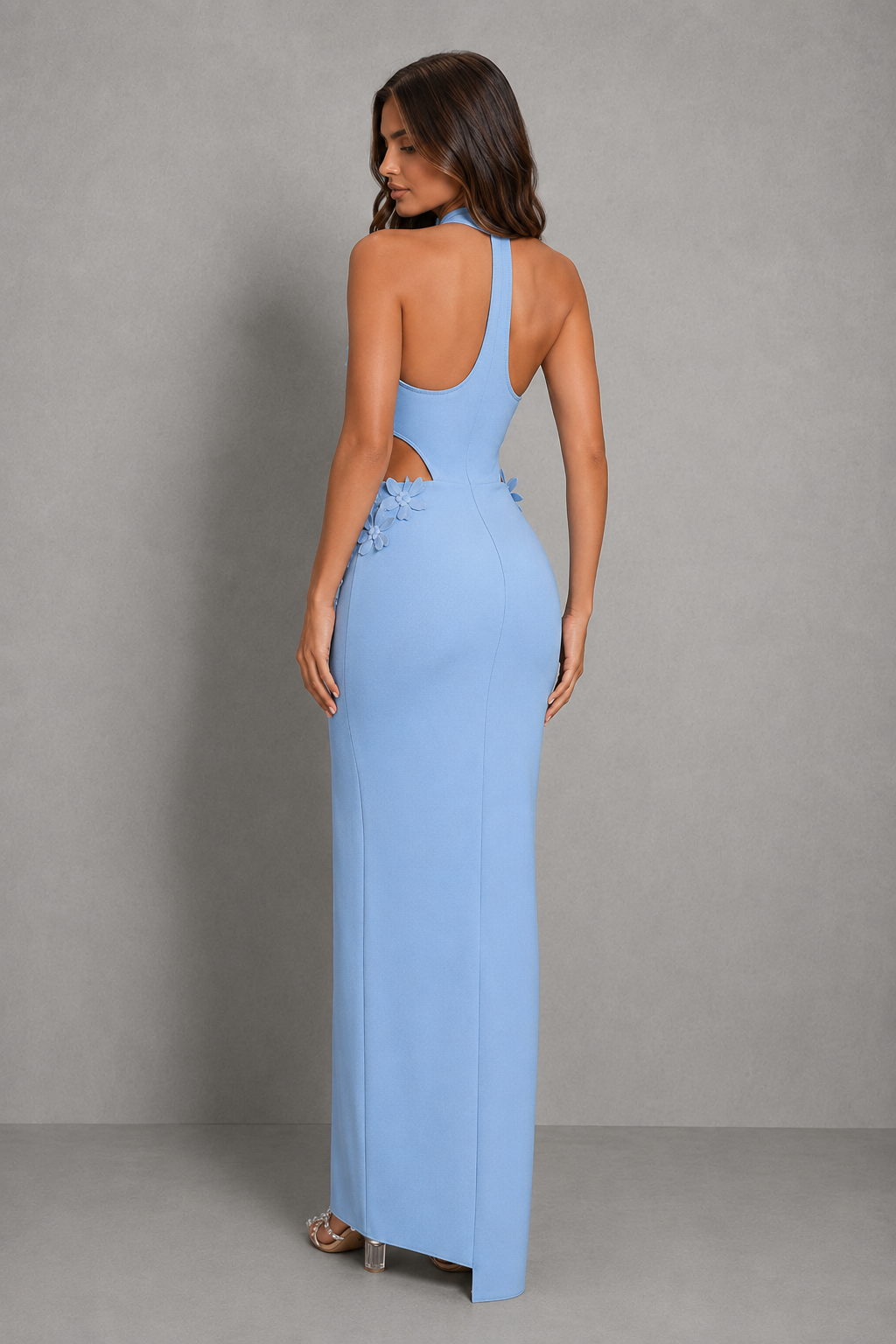 Women’s halter floral maxi dress with a fitted bodice, flowing A-line skirt, elegant floral print, and high side split.