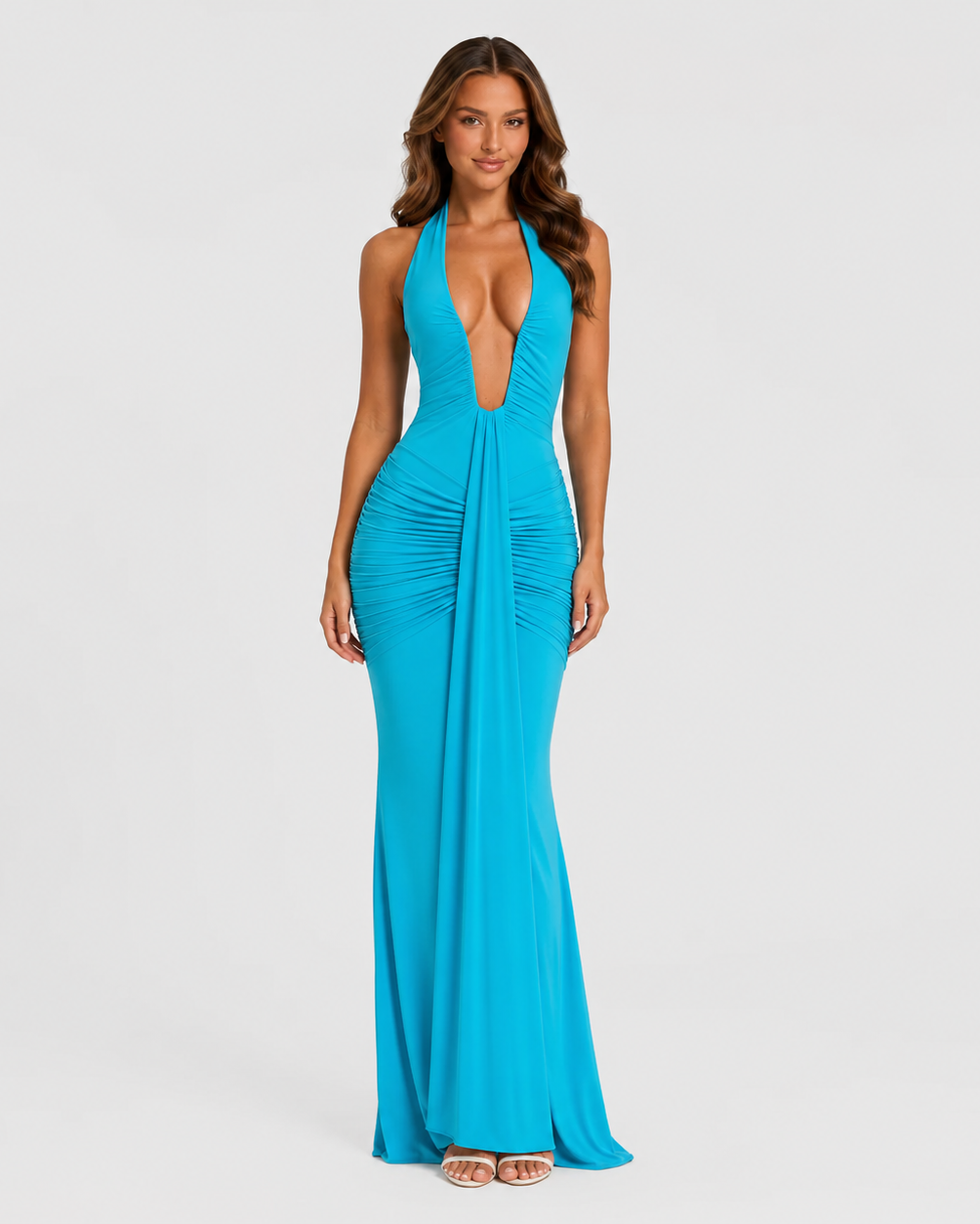 Women’s halter maxi dress in soft stretch jersey featuring a plunge neckline with U-wire detail, gathered draping, a flowing full-length skirt with train, and a dramatic front draped panel for an elegant occasionwear look.