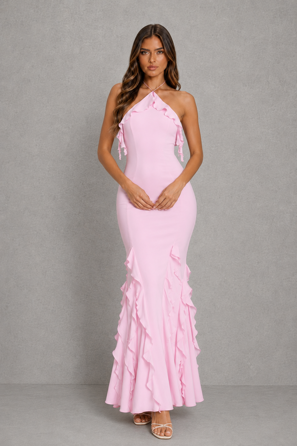 Women’s halterneck ruffle fishtail maxi dress with cascading ruffle detail, sculpting princess seams, and a figure-flattering bodycon silhouette.