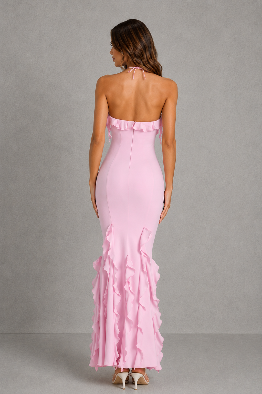 Women’s halterneck ruffle fishtail maxi dress with cascading ruffle detail, sculpting princess seams, and a figure-flattering bodycon silhouette.