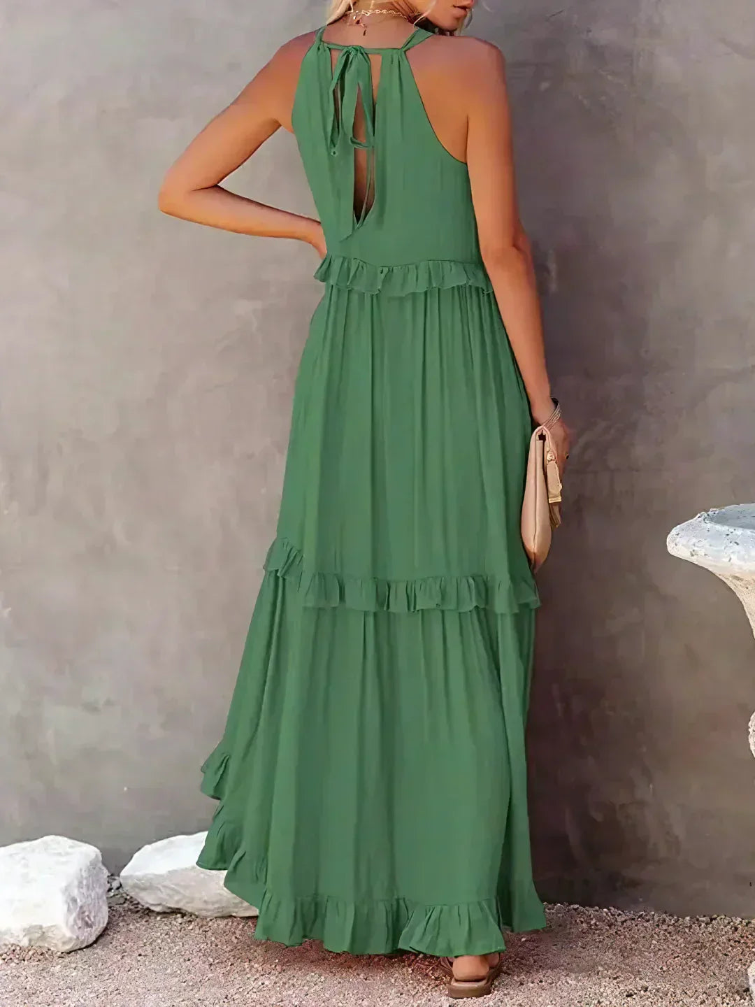 Women’s halterneck ruffle maxi dress with pockets and flowing silhouette