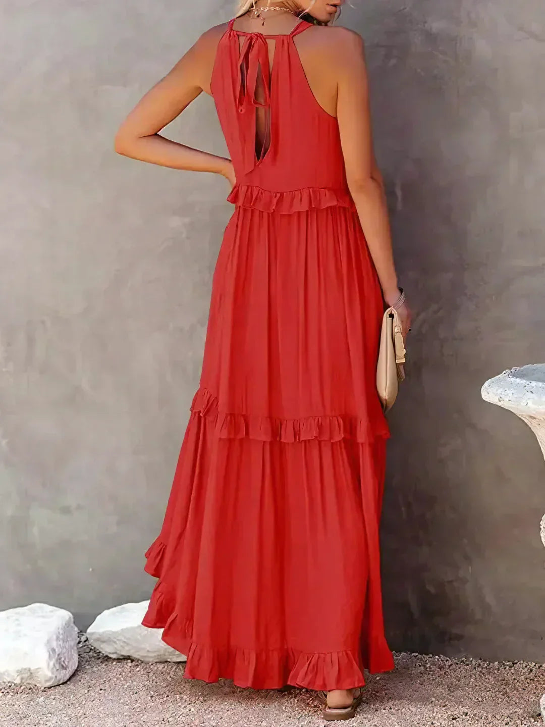 Women’s halterneck ruffle maxi dress with pockets and flowing silhouette