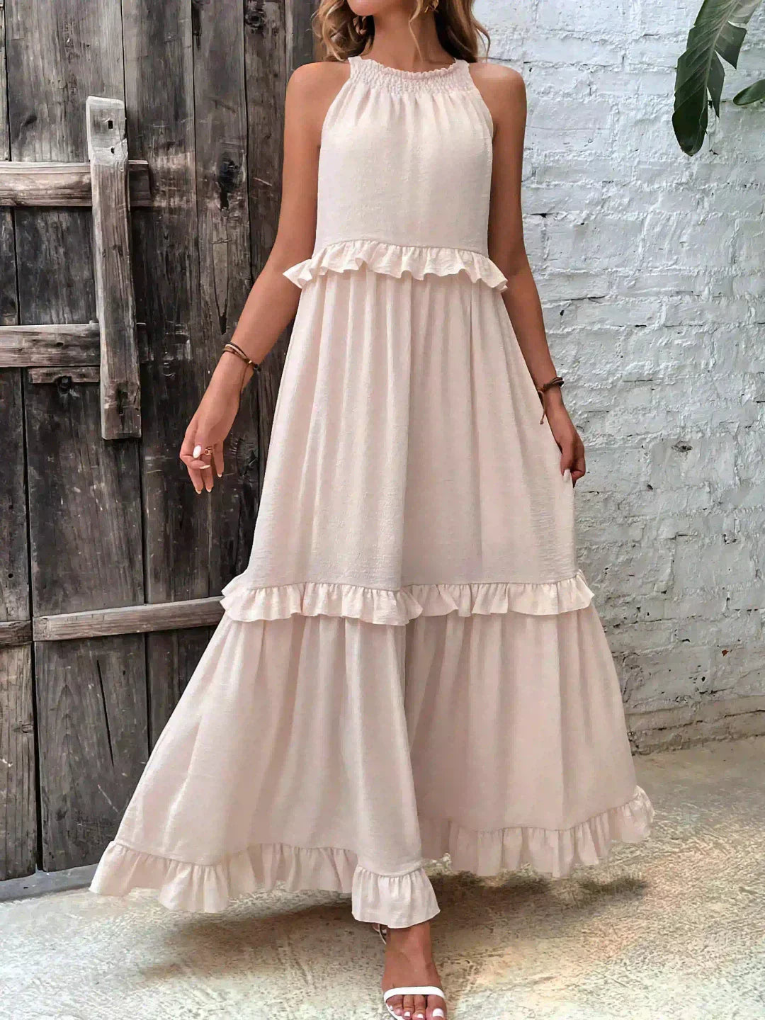 Women’s halterneck ruffle maxi dress with pockets and flowing silhouette