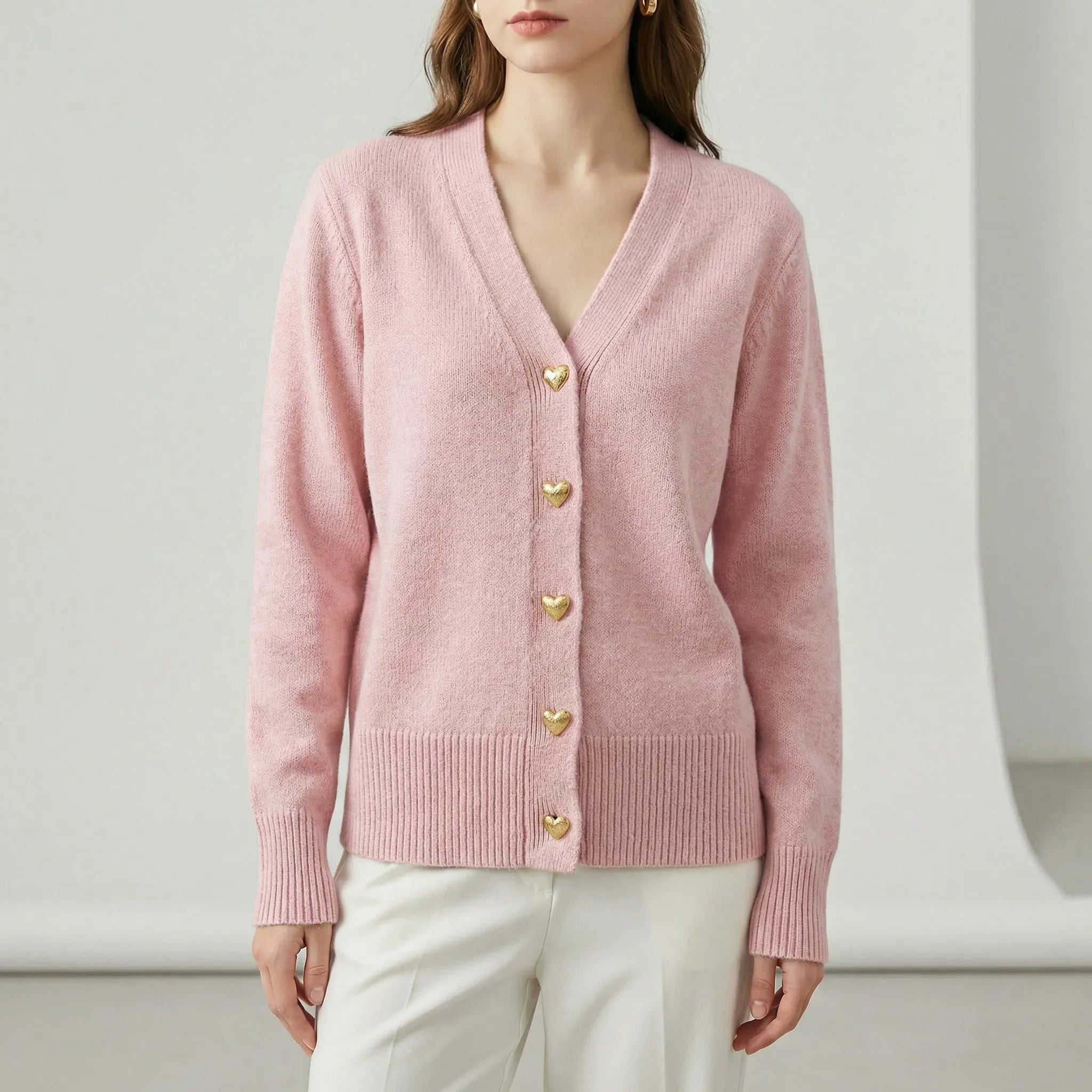 Women’s hip-length knit cardigan with V-neck and button-front closure