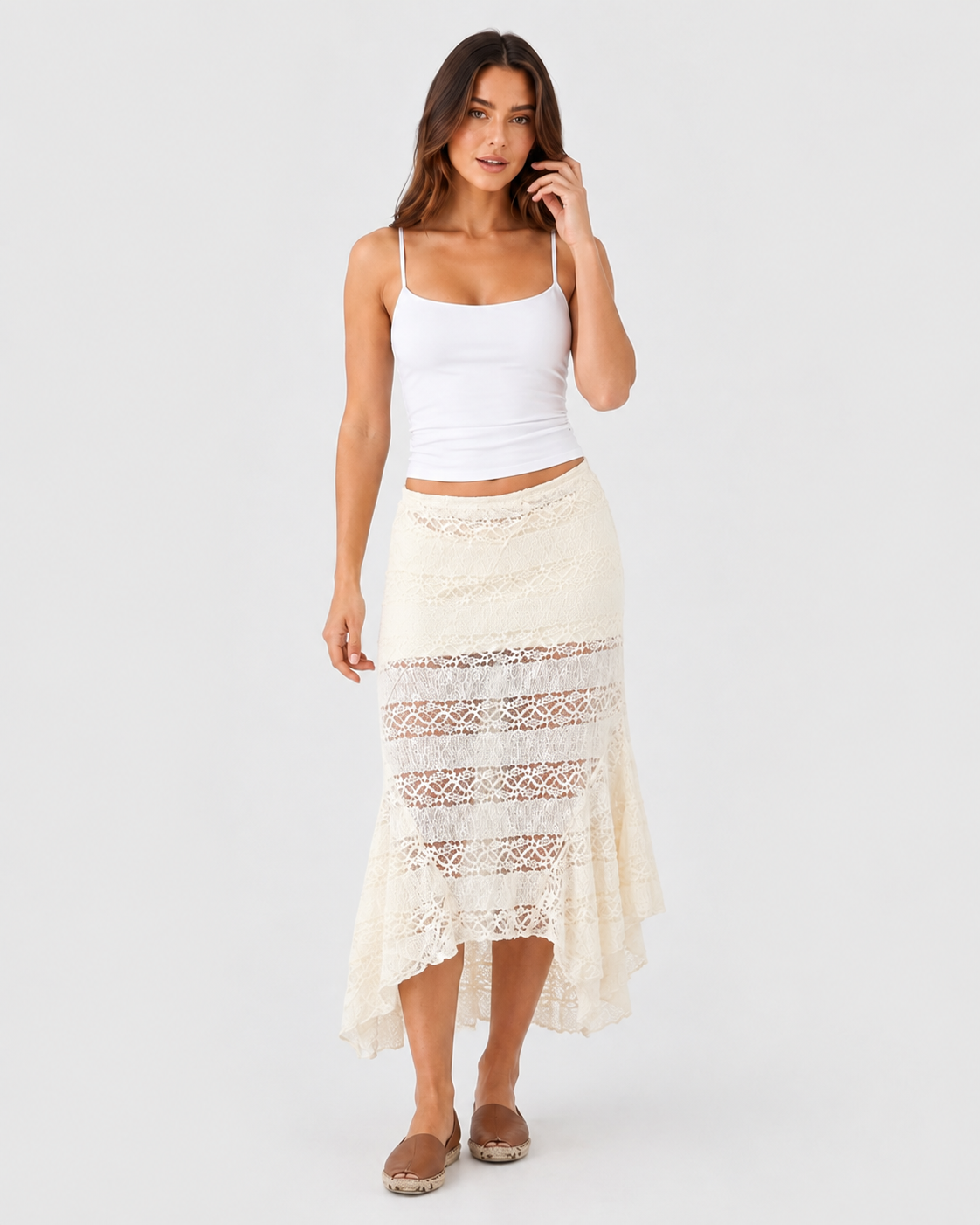 Women’s lace asymmetrical midi skirt with a flowing silhouette, delicate lace overlay, soft lining, and elastic waistband for comfortable everyday wear.