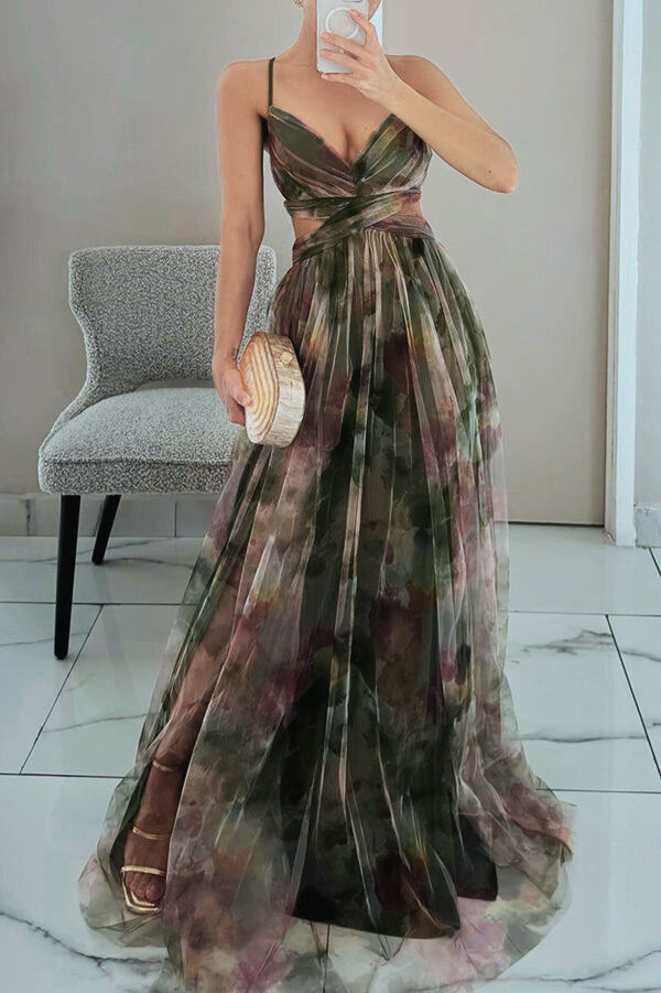 Women’s layered formal dress with flowing silhouette and soft painterly colors