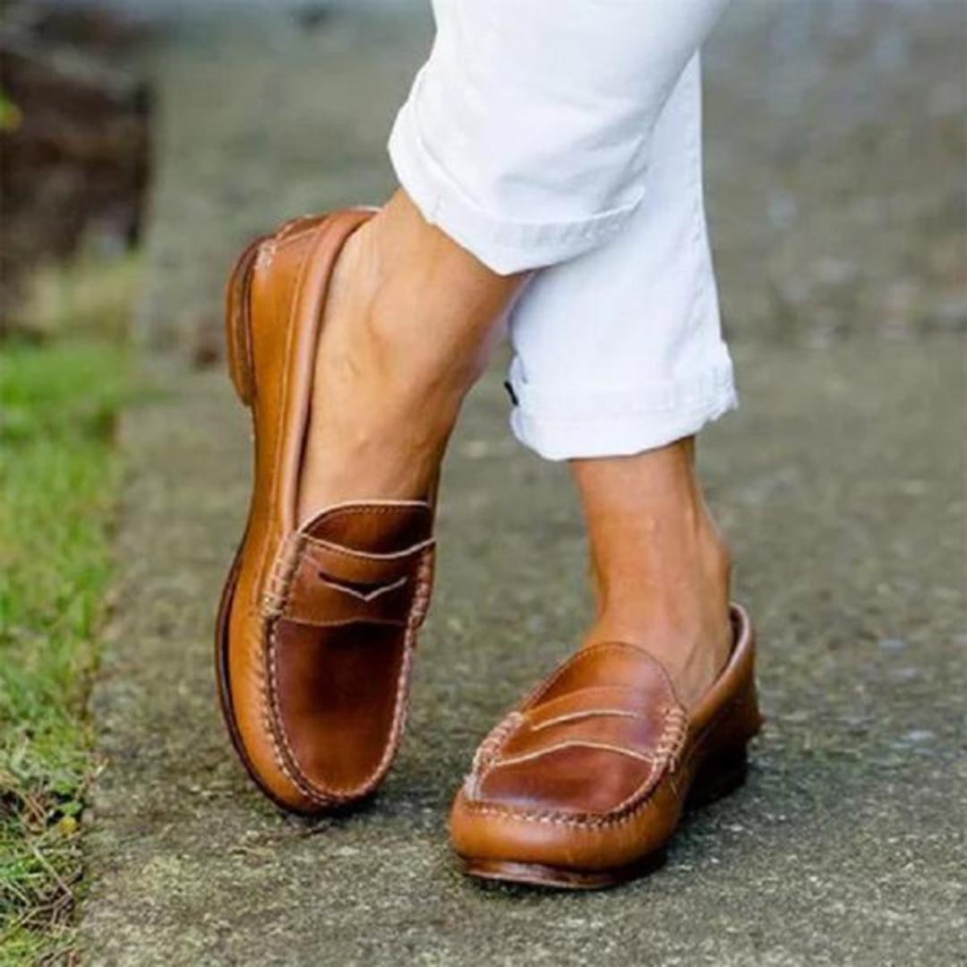 Women’s leather slip-on loafers with moc toe stitching