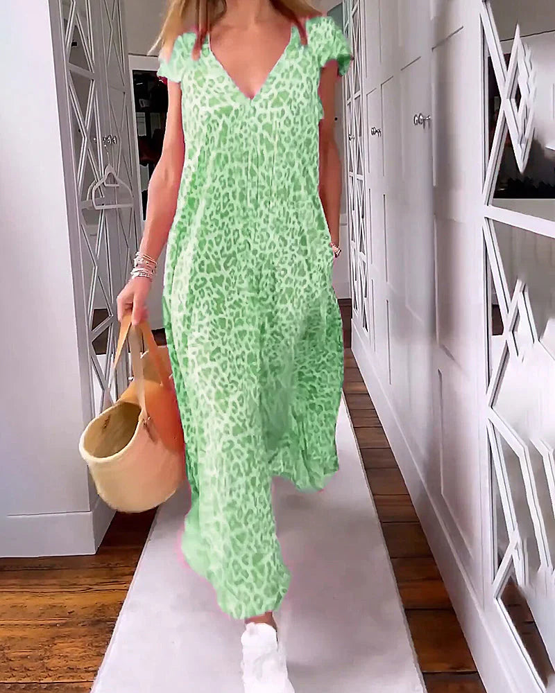 Women’s leopard print V-neck short sleeve maxi dress with flowy relaxed fit for casual and stylish wear