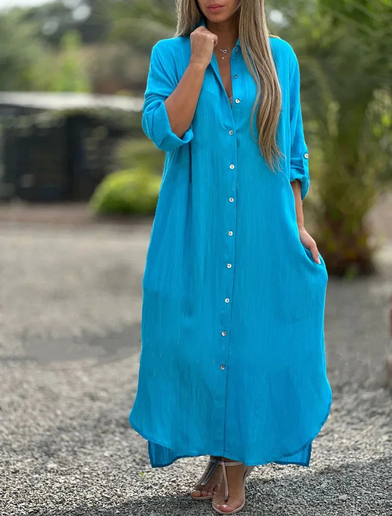 Women's light pink shirt dress with button front, relaxed fit, and casual feminine style