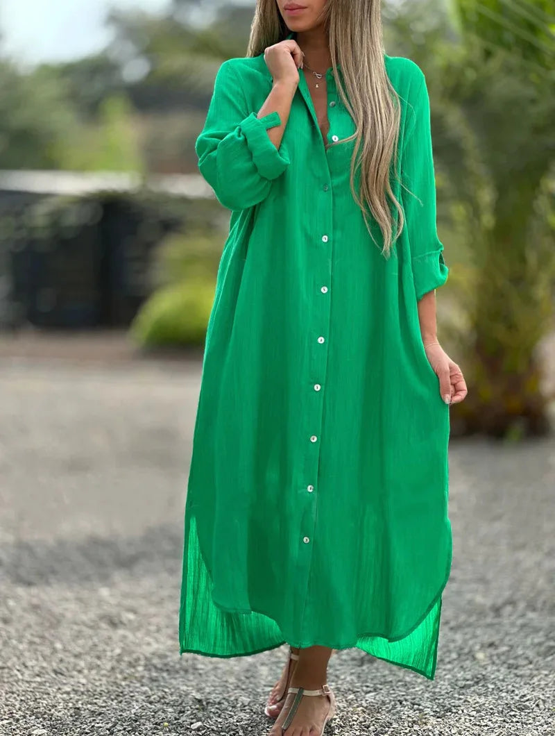 Women's light pink shirt dress with button front, relaxed fit, and casual feminine style