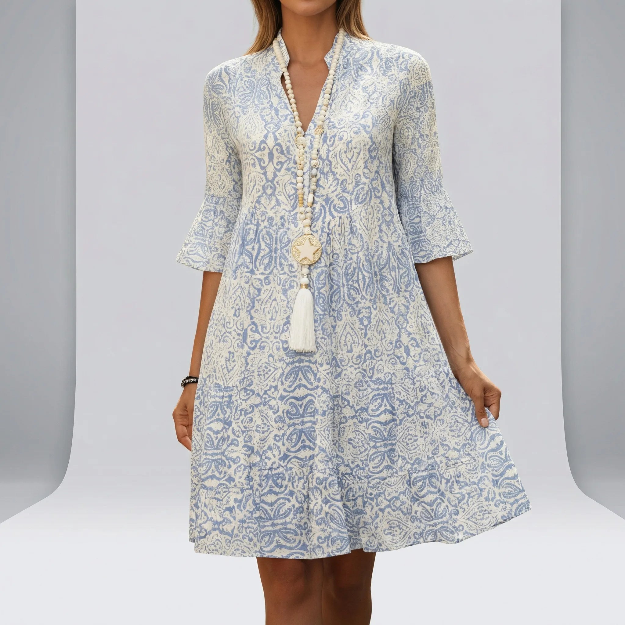 Women’s lightweight boho-inspired short-sleeve mini dress with V-neck