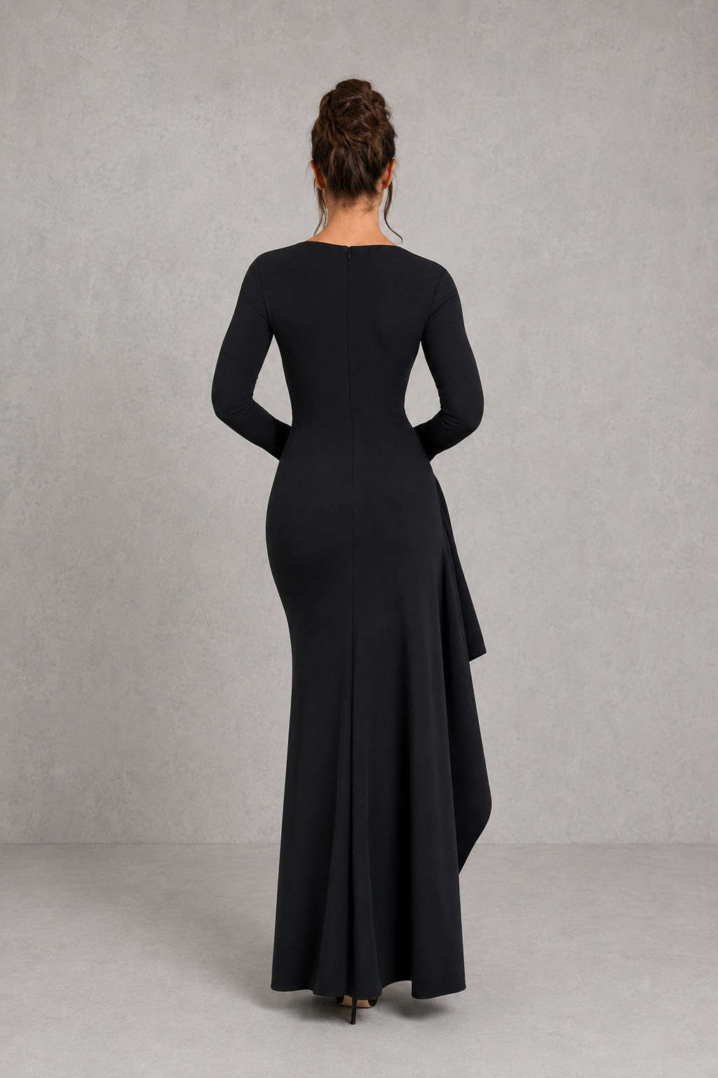 Women's long sleeve maxi evening dress in luxury stretch crepe featuring a fitted silhouette, pleated waist, draped thigh-high split, flared cuffs, and flowing skirt for formal occasions.