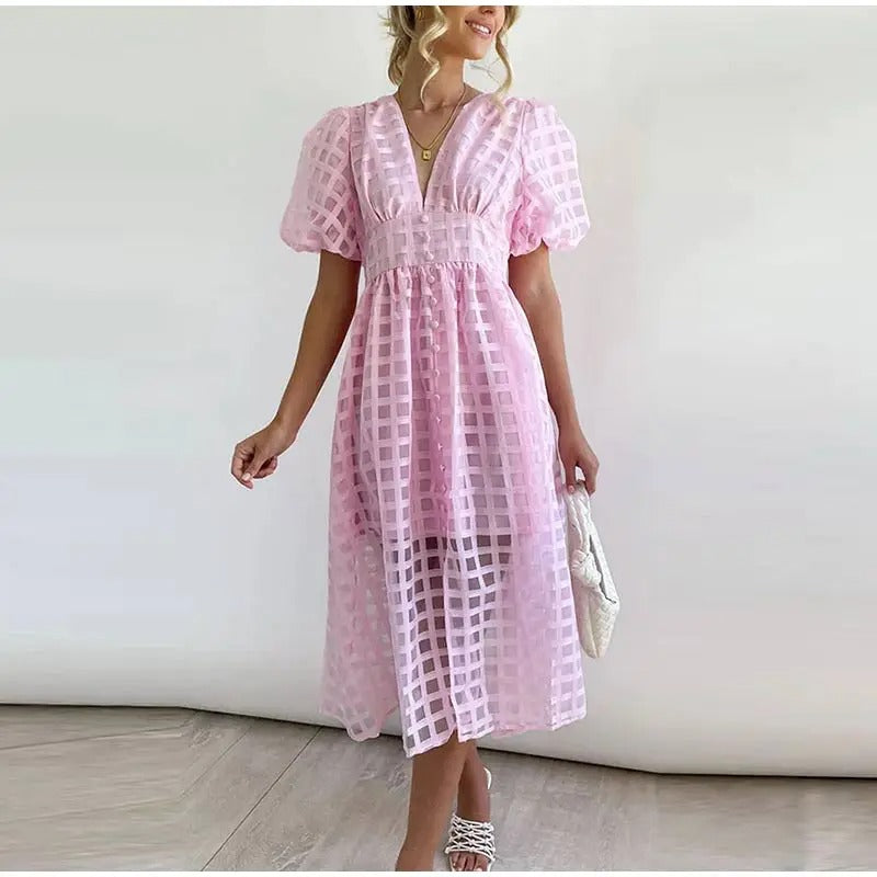 Women’s midi dress with structured bodice and flowing skirt