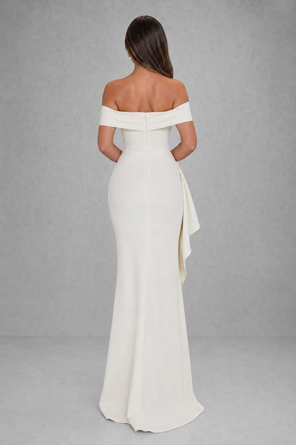 Woman wearing a women’s off shoulder stretch crepe maxi dress featuring a Bardot neckline, flattering side gather detail, body-contouring silhouette, and thigh-high side split, creating an elegant look for formal events, weddings, and evening occasions.