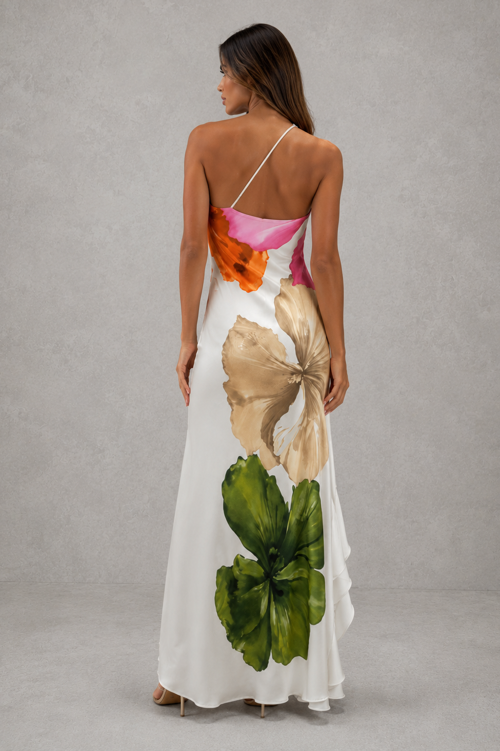 Women's one shoulder floral maxi dress with oversized botanical print, flowing silhouette, and ruffle hem in lightweight fabric for summer occasions, weddings, and resort wear.