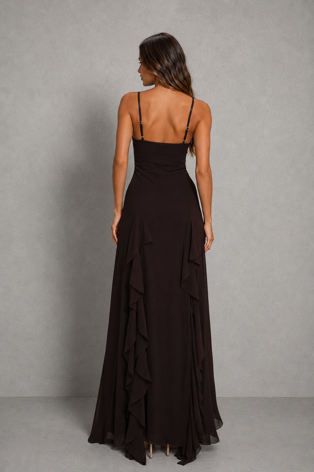Women’s plunge neck maxi dress with thin adjustable straps, feminine frill detailing, fitted silhouette, and elegant high side split.