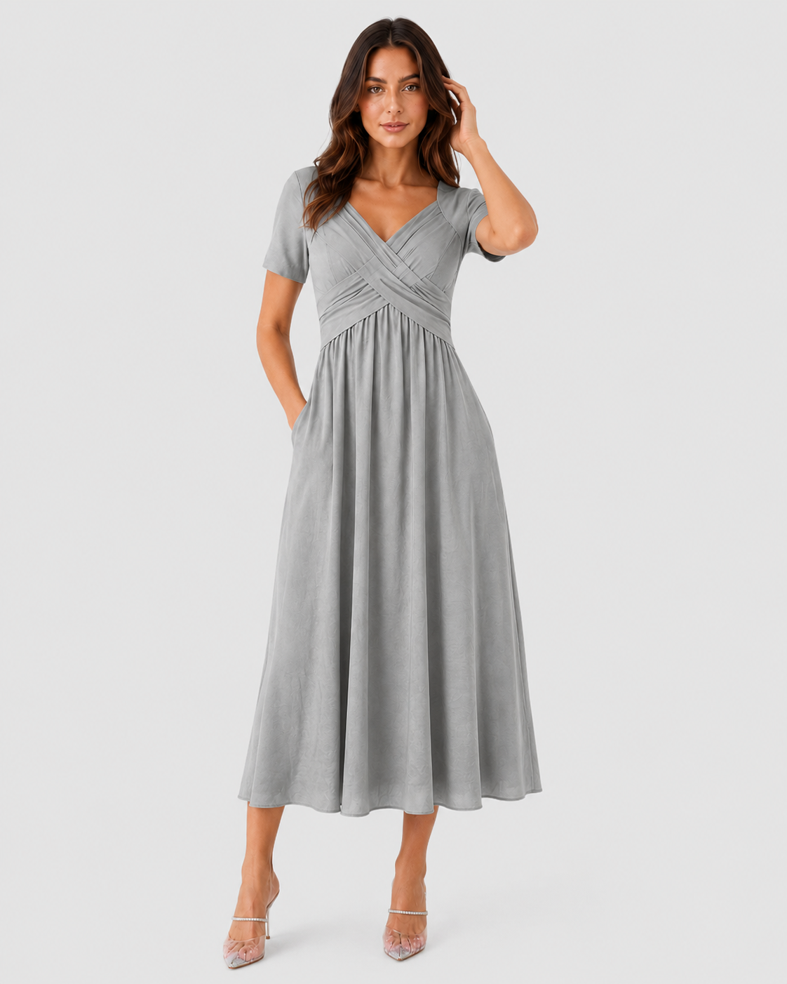 Women's relaxed-fit midi dress made from lightweight polyester fabric. Designed with a clean, versatile silhouette that falls below the knee, offering comfort and ease of movement for everyday wear. Suitable for casual outings or more polished occasions. Machine washable and true to size with light shaping through the fit.