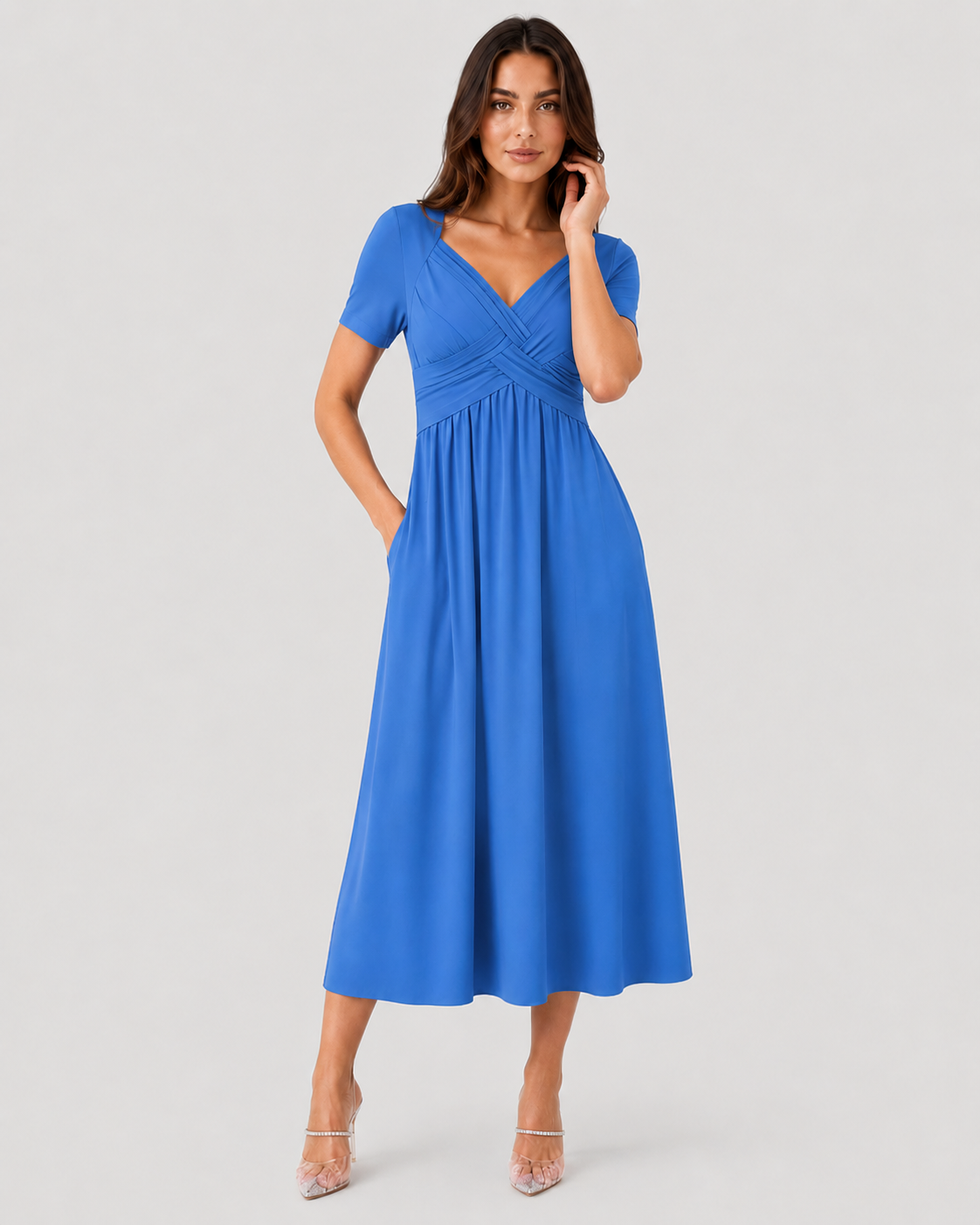 Women's relaxed-fit midi dress made from lightweight polyester fabric. Designed with a clean, versatile silhouette that falls below the knee, offering comfort and ease of movement for everyday wear. Suitable for casual outings or more polished occasions. Machine washable and true to size with light shaping through the fit.
