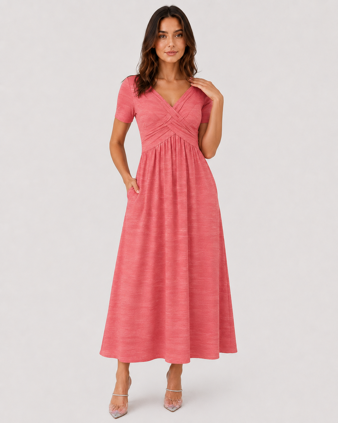Women's relaxed-fit midi dress made from lightweight polyester fabric. Designed with a clean, versatile silhouette that falls below the knee, offering comfort and ease of movement for everyday wear. Suitable for casual outings or more polished occasions. Machine washable and true to size with light shaping through the fit.