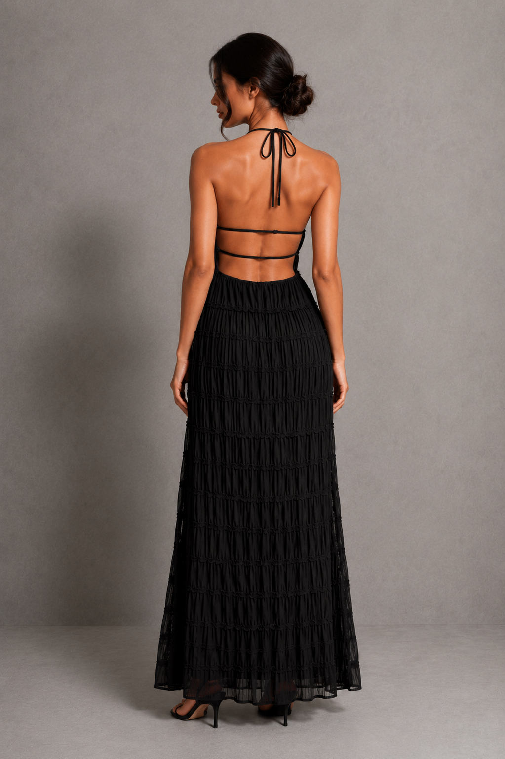 Women's ruched smocked maxi dress with a stretchy bodice, adjustable tie detail and flowing silhouette, perfect for holidays, garden parties, brunch and summer occasions.