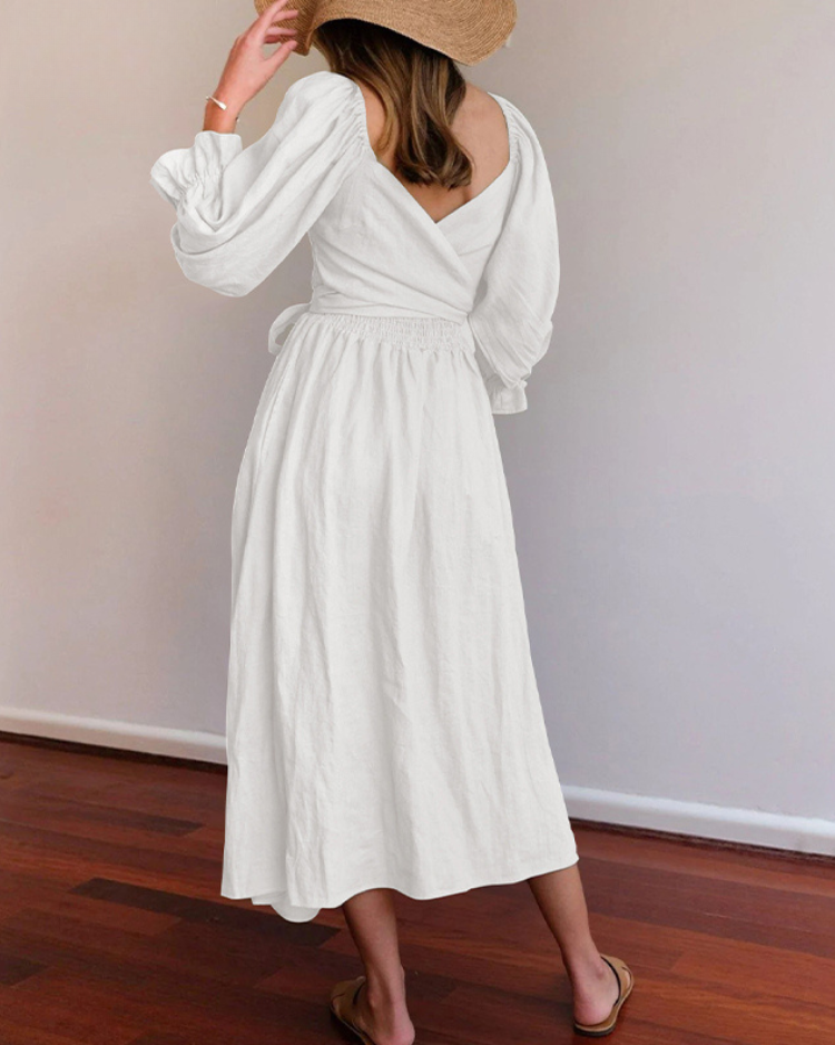 Women wearing midi dress with French ruffle sleeves and side cutout detail in slim fit silhouette