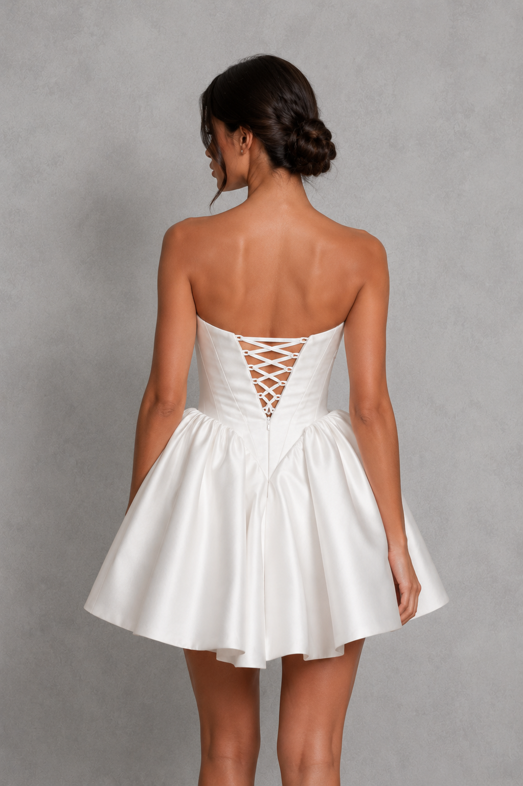 Women's satin corset bridal mini dress with hand-draped bust cups, a structured fitted bodice and a sleek mini silhouette, ideal for weddings, receptions and bridal celebrations.