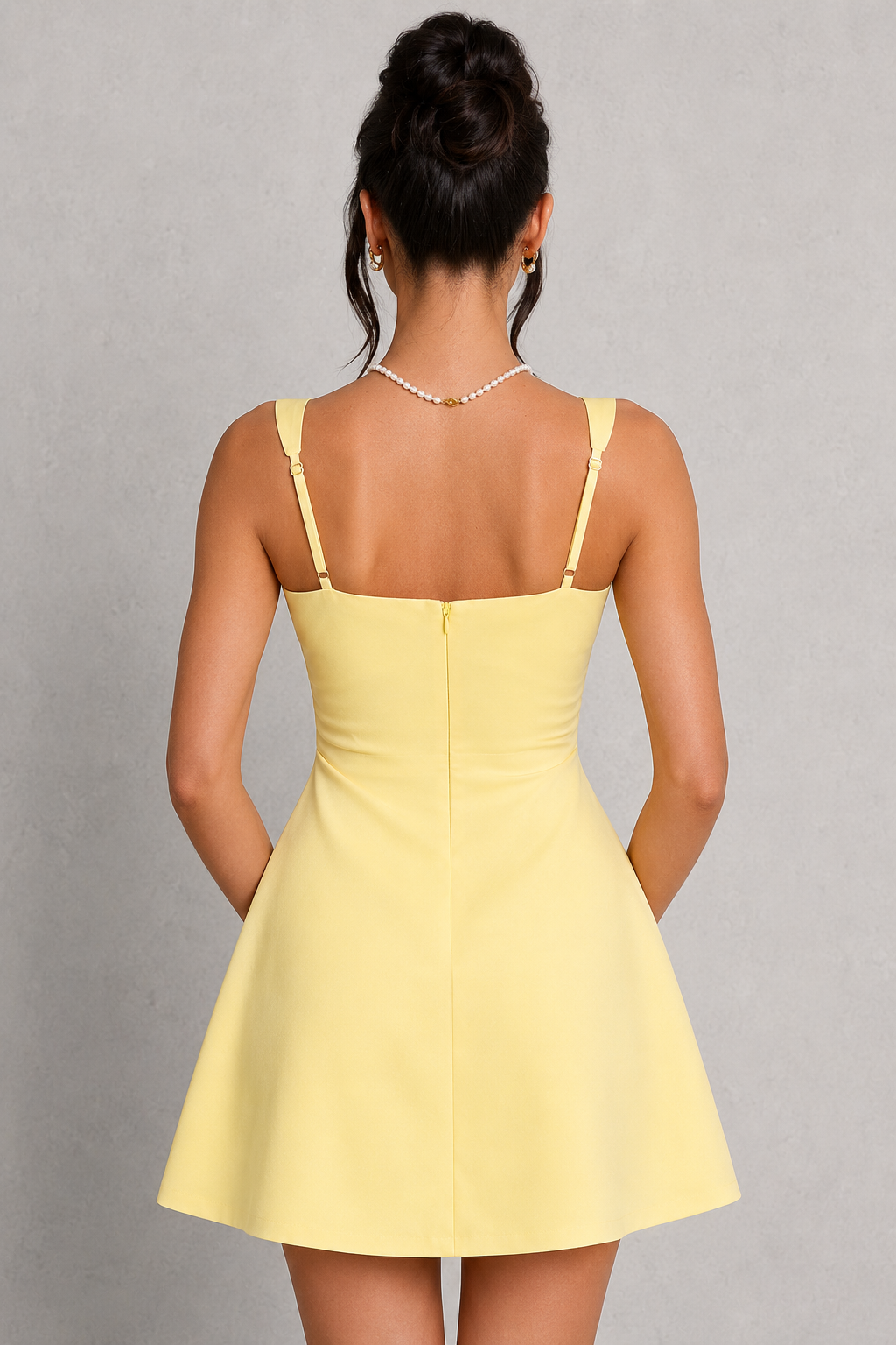 Women's satin bubble hem mini dress featuring a square neckline, fan-shaped adjustable shoulder straps, fitted pleated bodice, snatched waist, and voluminous bubble skirt. Crafted from lustrous satin with a fully lined finish, this elegant party dress offers a flattering silhouette for special occasions and celebrations.
