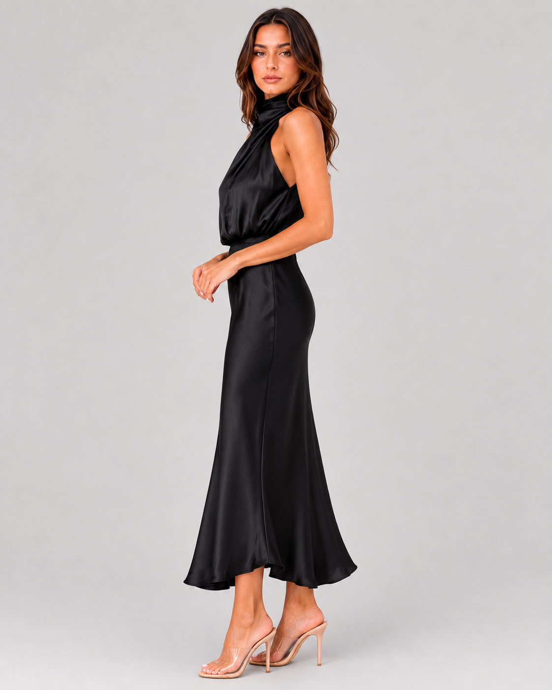 Women’s satin one-shoulder midi dress featuring a side slit, smooth fabric, and flowing silhouette for an elegant and modern occasion-ready look.