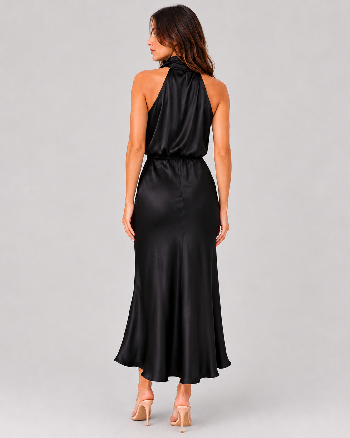 Women’s satin one-shoulder midi dress featuring a side slit, smooth fabric, and flowing silhouette for an elegant and modern occasion-ready look.