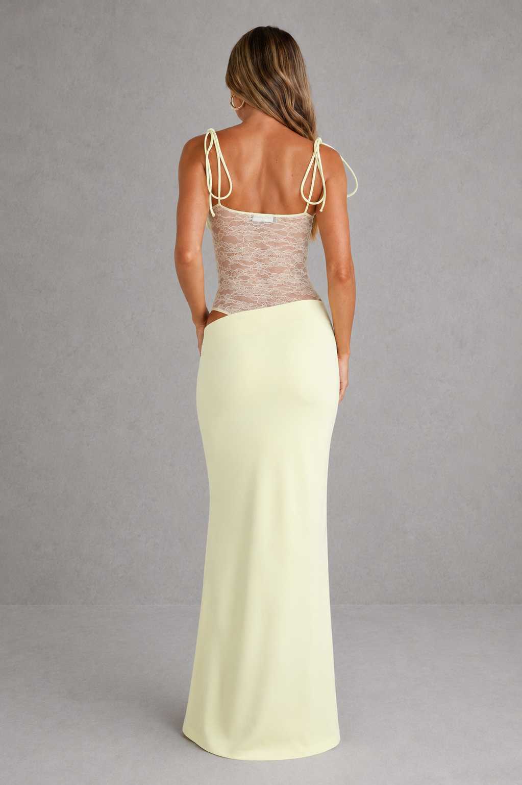 Women's sleeveless lace panel cut-out maxi dress featuring a fitted bodycon bodice, elegant neckline, delicate lace patchwork details, and a flowing maxi-length skirt, ideal for evening events, formal occasions, and special celebrations.